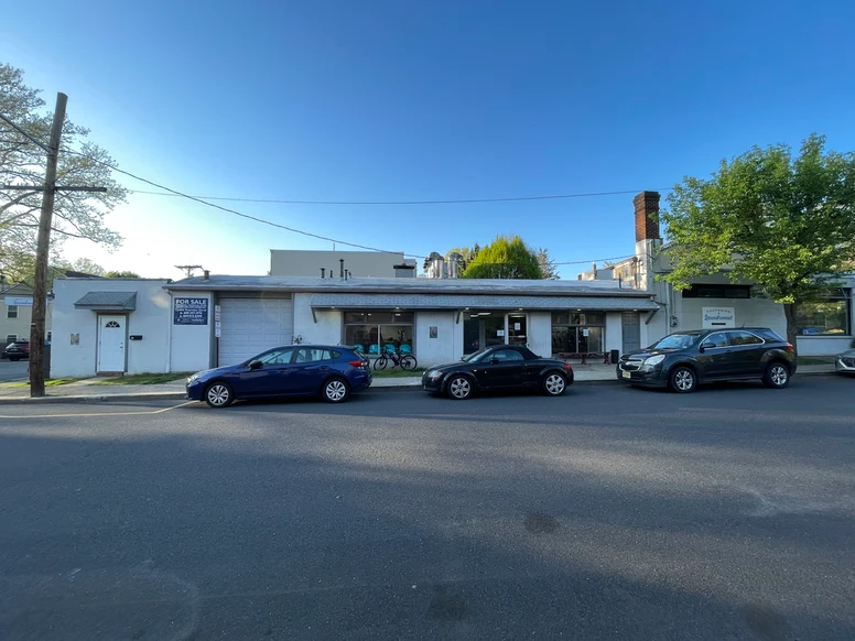 a long low building with a laudromat in the center