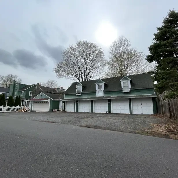 a row of six garage doors
