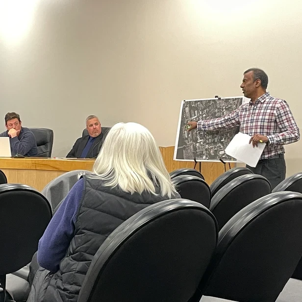 Eric pointing to a map during his presentation