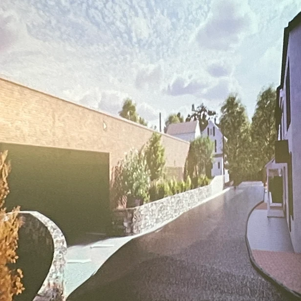 the entrance to the lower level parking garage off of Lambert Lane