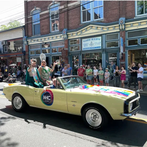 Mr. and Miss New Hope Celebrates ride on the back of a classic convertable car