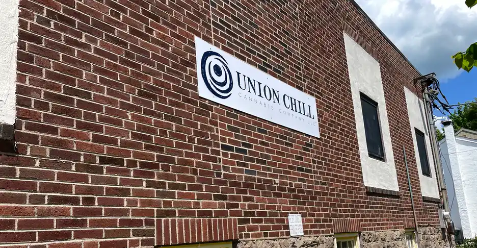 a brick building with a sign on it that reads "Union Chill"