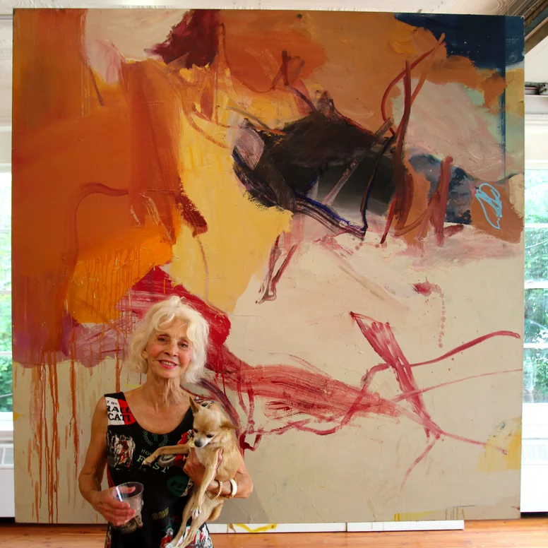 Maureen Chatfield holding her dog Bambi 