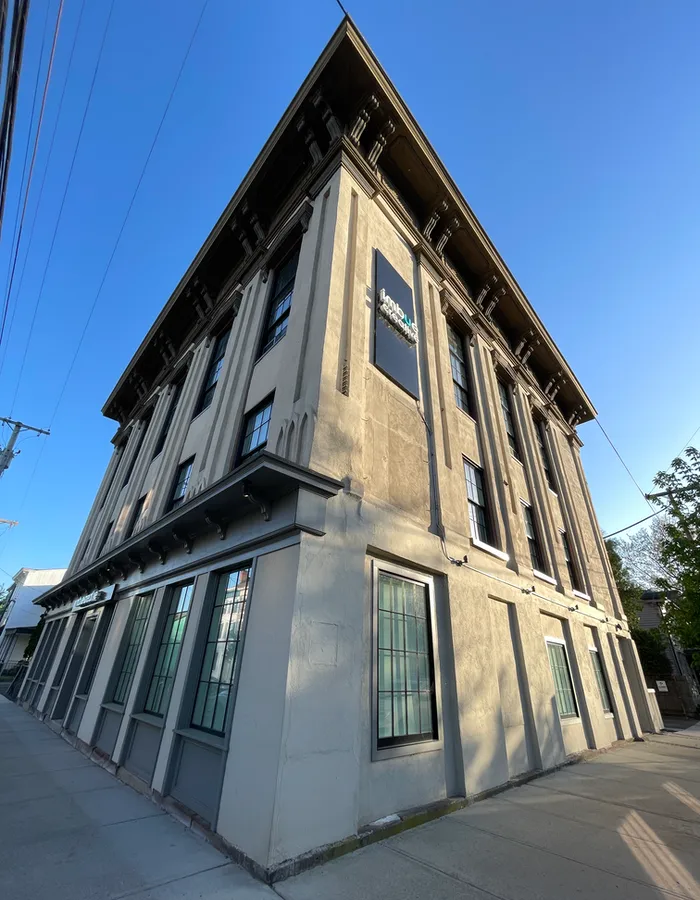 an old three story building on Main Street
