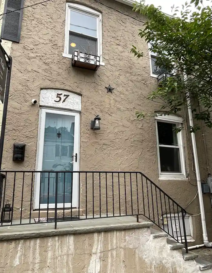 stucco covered facade on a two-story Lambertville row home