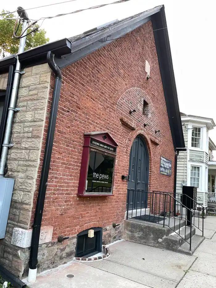 the redone facade of an old brick church