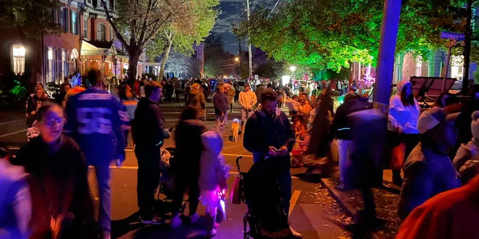 A crowd of people on Halloween
