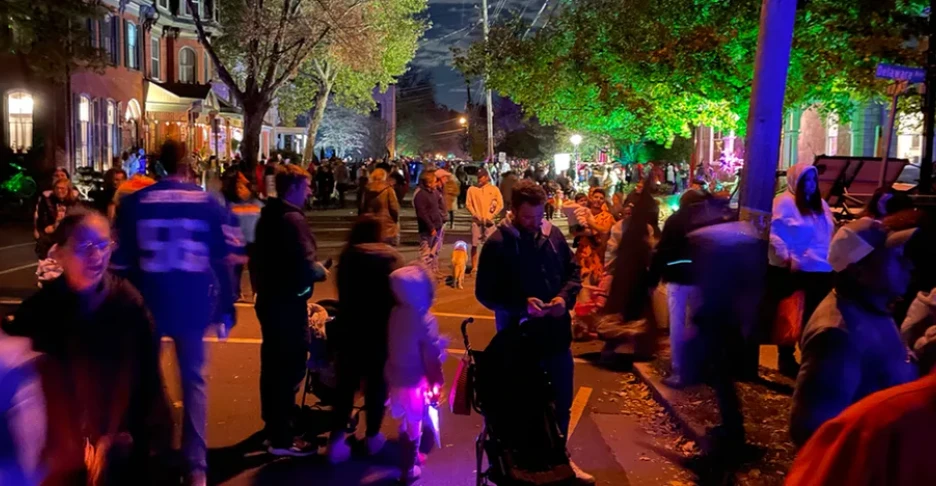A crowd of people on Halloween